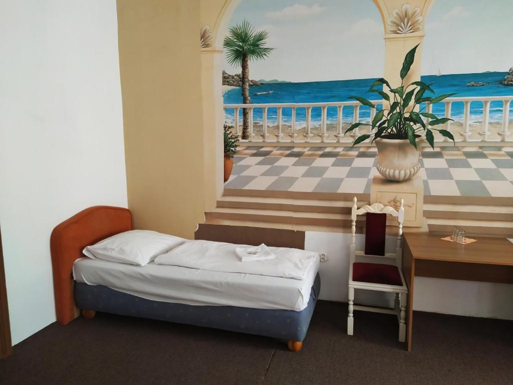 Säng eller sängar i ett rum på Tourist room Maria