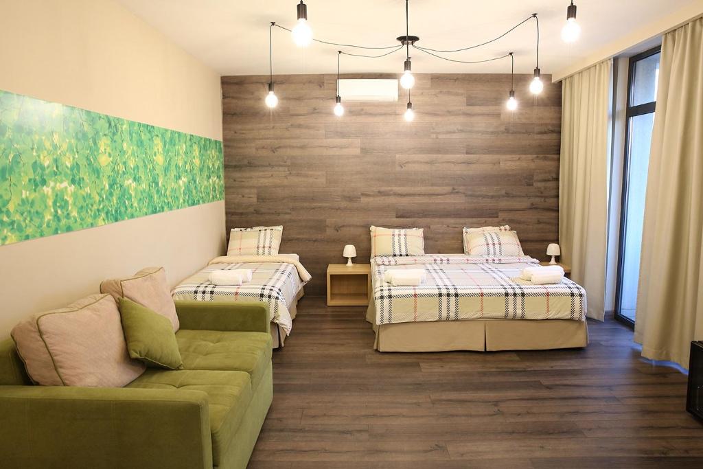 Postel nebo postele na pokoji v ubytování Wine Hotel Chisinau