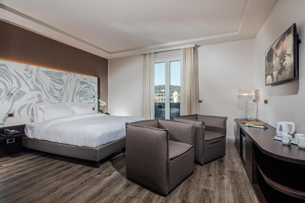 Postel nebo postele na pokoji v ubytování Hotel Franz
