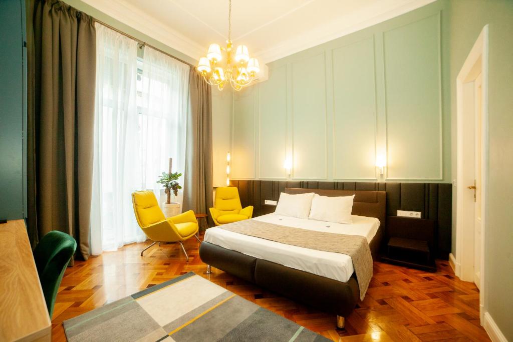 Postel nebo postele na pokoji v ubytování Matei Corvin Apartment