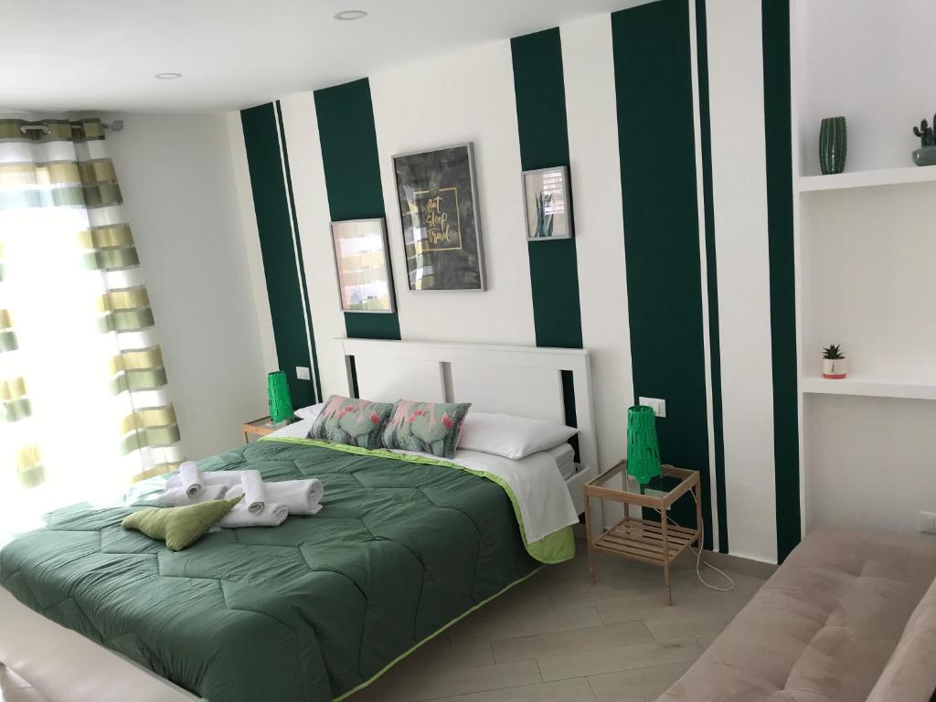 Posteľ alebo postele v izbe v ubytovaní centruMassimo b&b