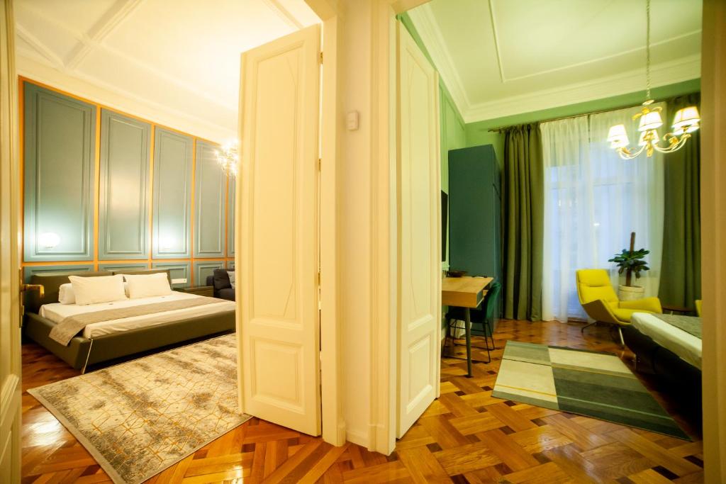Postel nebo postele na pokoji v ubytování Matei Corvin Apartment