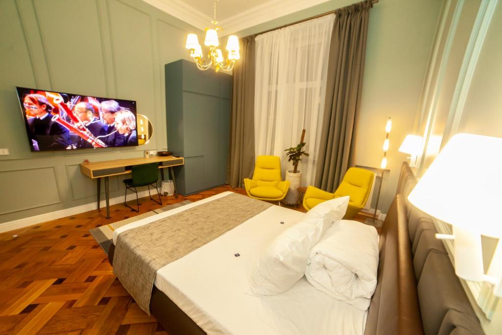 TV a/nebo společenská místnost v ubytování Matei Corvin Apartment