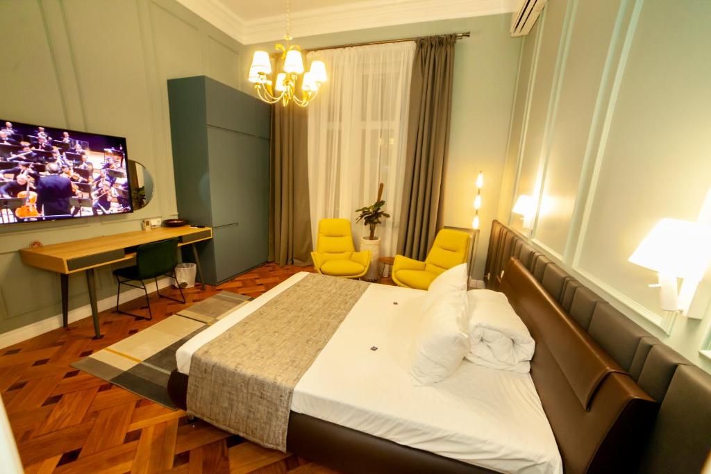 Postel nebo postele na pokoji v ubytování Matei Corvin Apartment