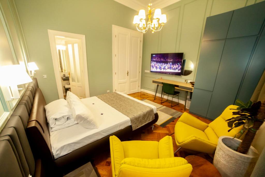 TV a/nebo společenská místnost v ubytování Matei Corvin Apartment