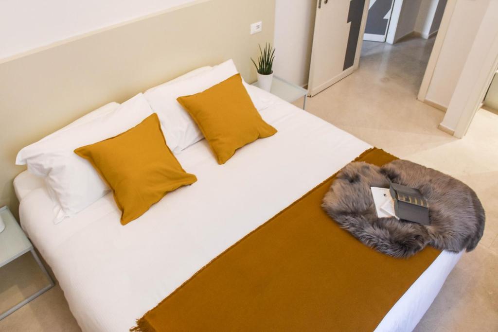 Postel nebo postele na pokoji v ubytování Garibaldi23 Rooms
