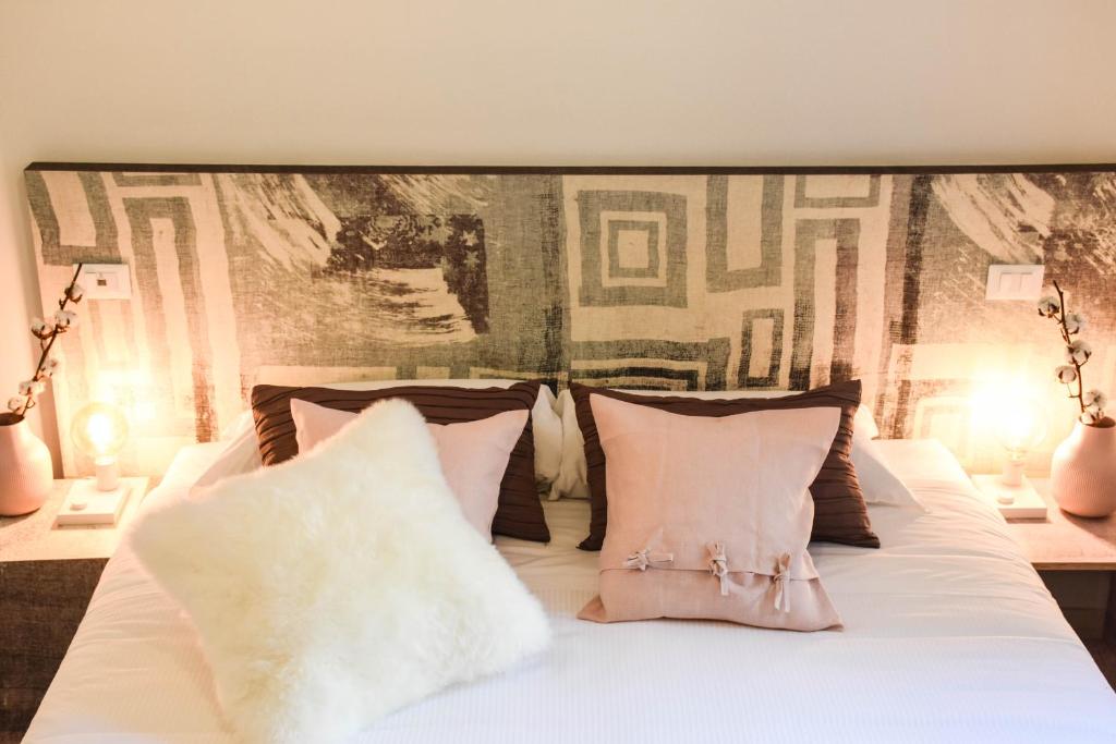 Postel nebo postele na pokoji v ubytování Garibaldi23 Rooms