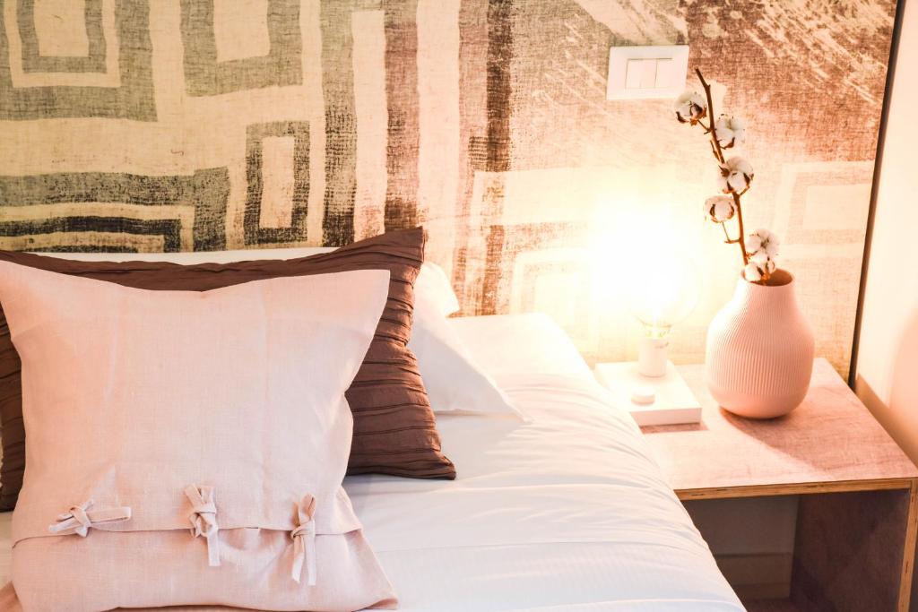 Postel nebo postele na pokoji v ubytování Garibaldi23 Rooms