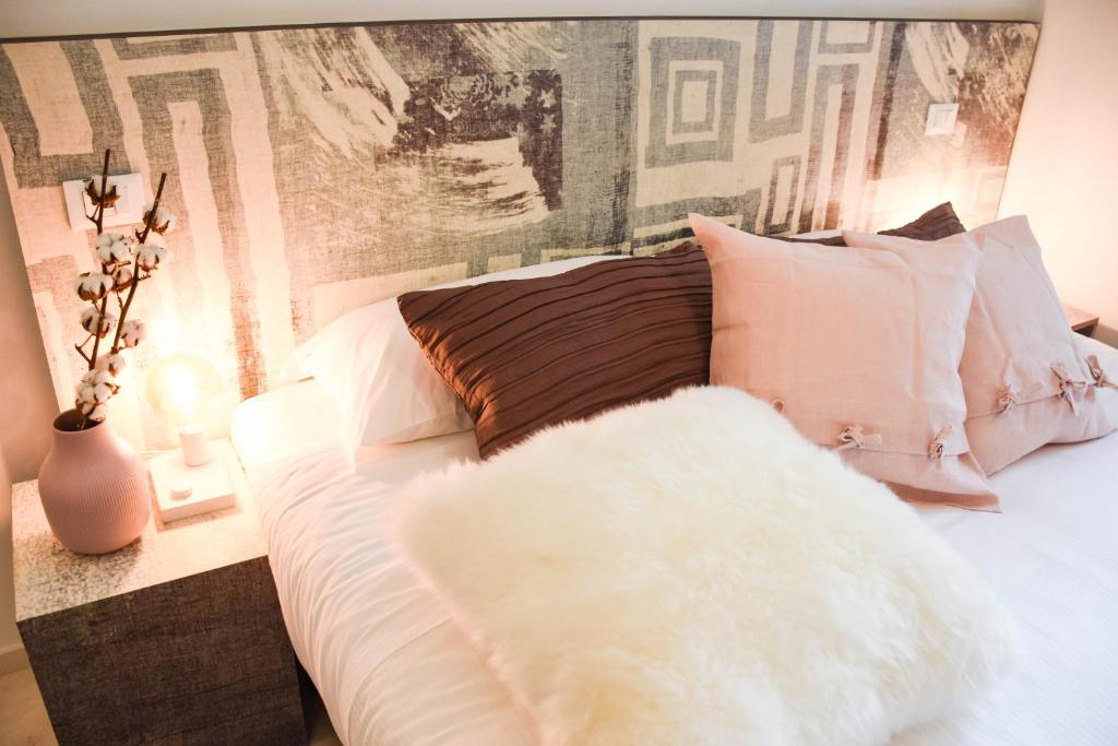Postel nebo postele na pokoji v ubytování Garibaldi23 Rooms