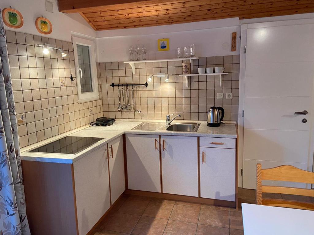 Kuchyň nebo kuchyňský kout v ubytování Holiday Home Darko