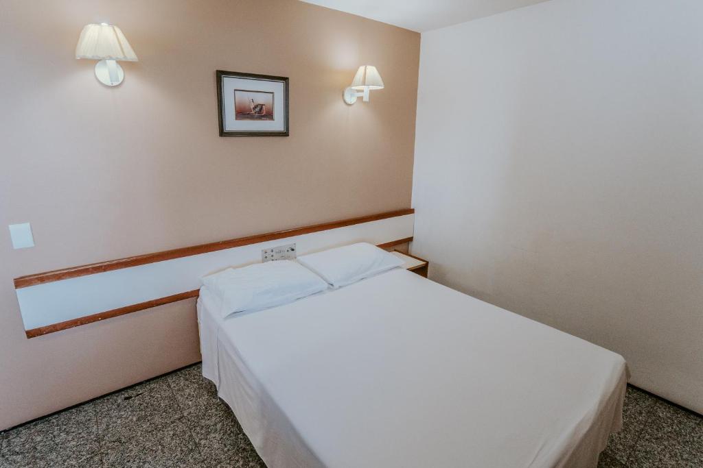 Voodi või voodid majutusasutuse Iracema Residence Hotel Flat toas