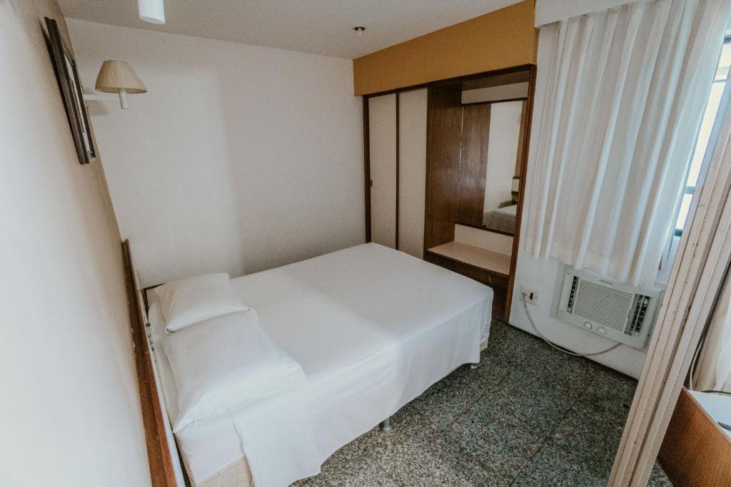 Voodi või voodid majutusasutuse Iracema Residence Hotel Flat toas