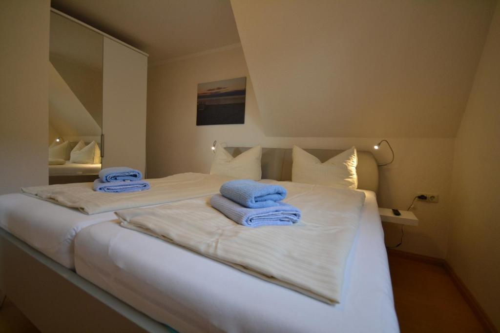 Postel nebo postele na pokoji v ubytování Haus Sir Henry