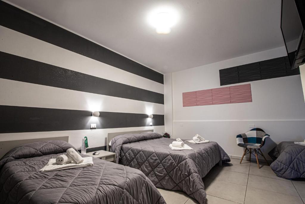 Postel nebo postele na pokoji v ubytování Piano Monaco