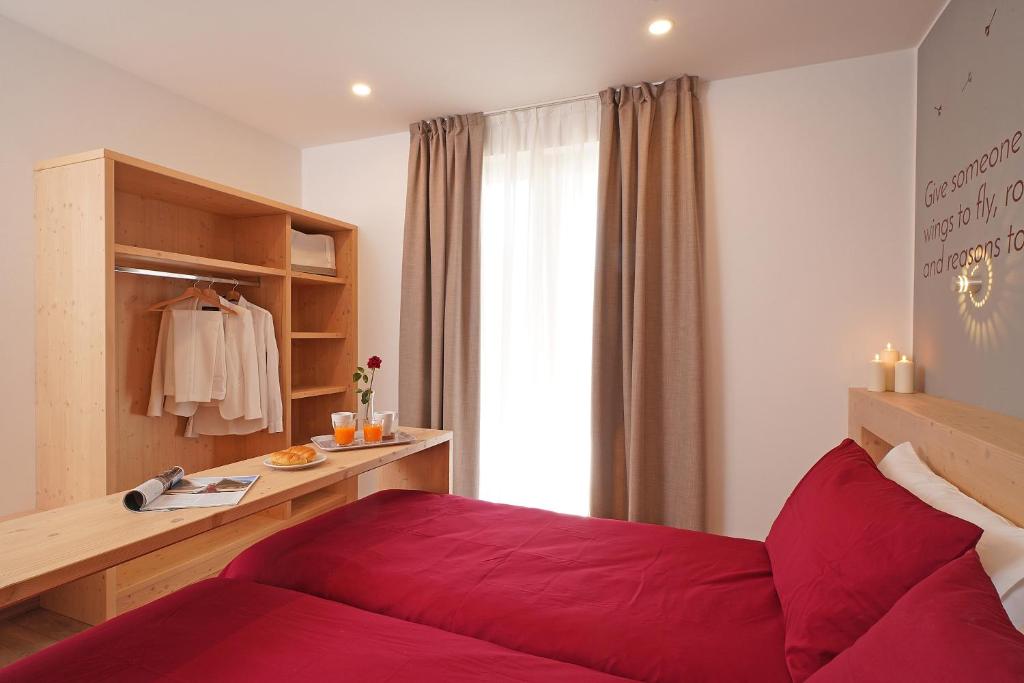 Postel nebo postele na pokoji v ubytování Agriturismo Hegemone