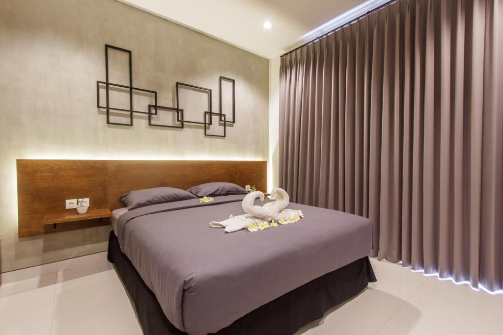 The jero 18 kuta guest house - Deluxe Room