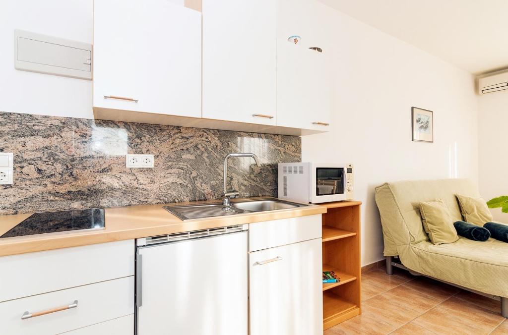 Kuchyň nebo kuchyňský kout v ubytování Villa Lavanda