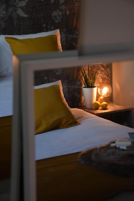Postel nebo postele na pokoji v ubytování Garibaldi23 Rooms