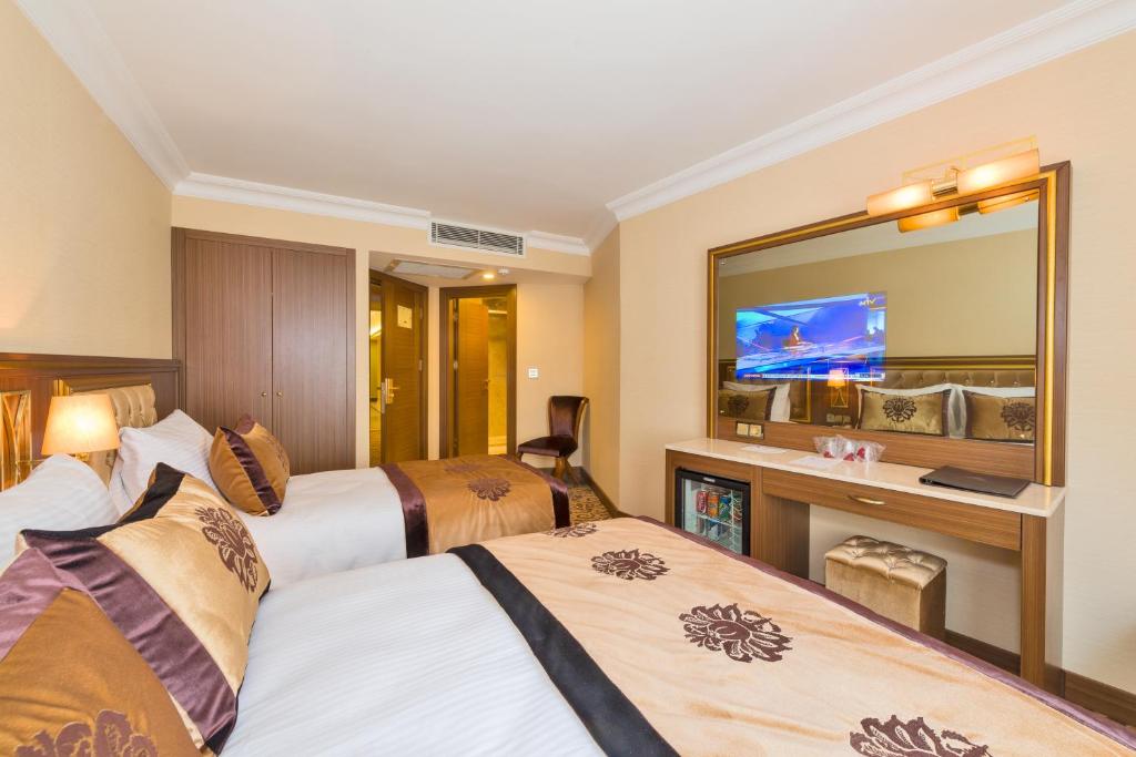 Postel nebo postele na pokoji v ubytování Antea Hotel Oldcity -Special Category