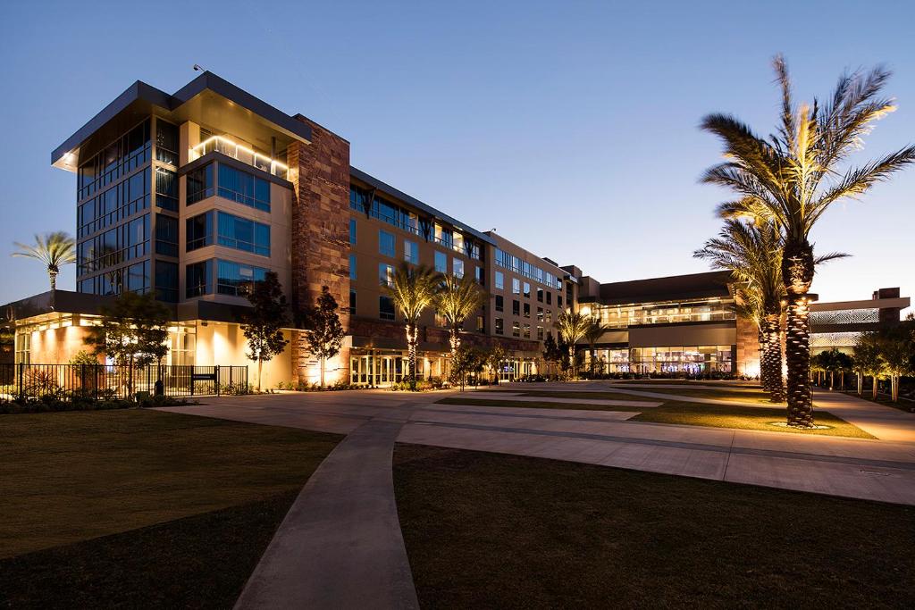 a large building with palm trees in front of it at Viejas Casino & Willows Hotel in Alpine