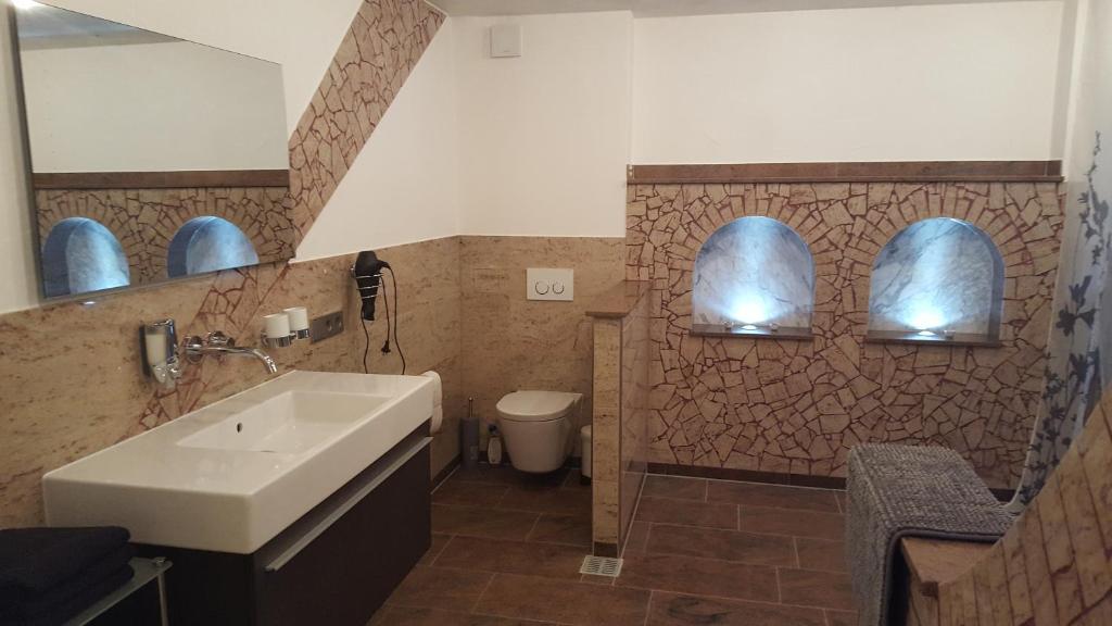 Koupelna v ubytování Rust-Fewo-Hotel