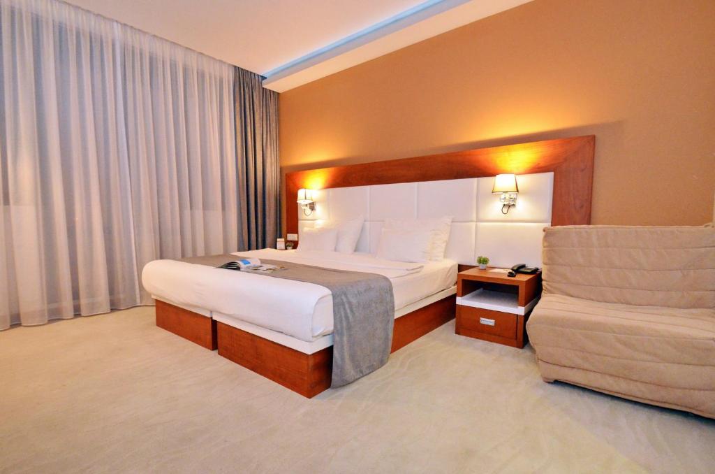 Postel nebo postele na pokoji v ubytování Hotel Porto In