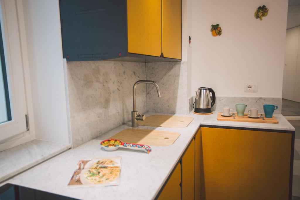 Kuchyňa alebo kuchynka v ubytovaní New apartment with patio