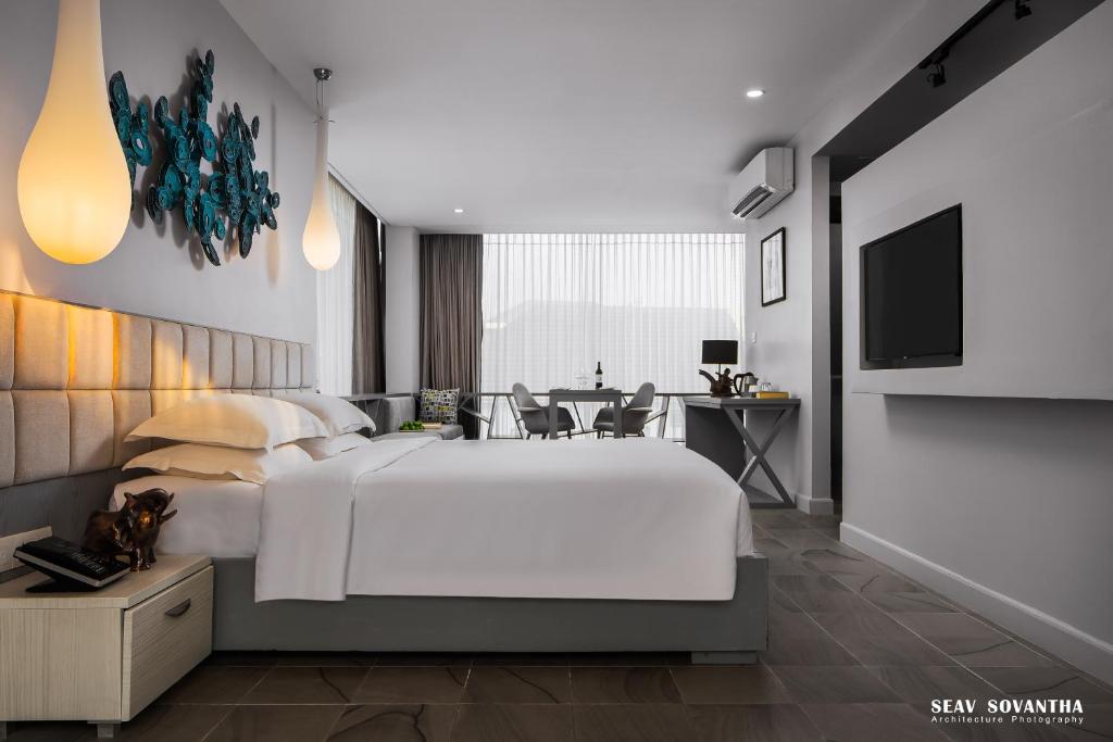 Postel nebo postele na pokoji v ubytování Damrei Residence & Spa