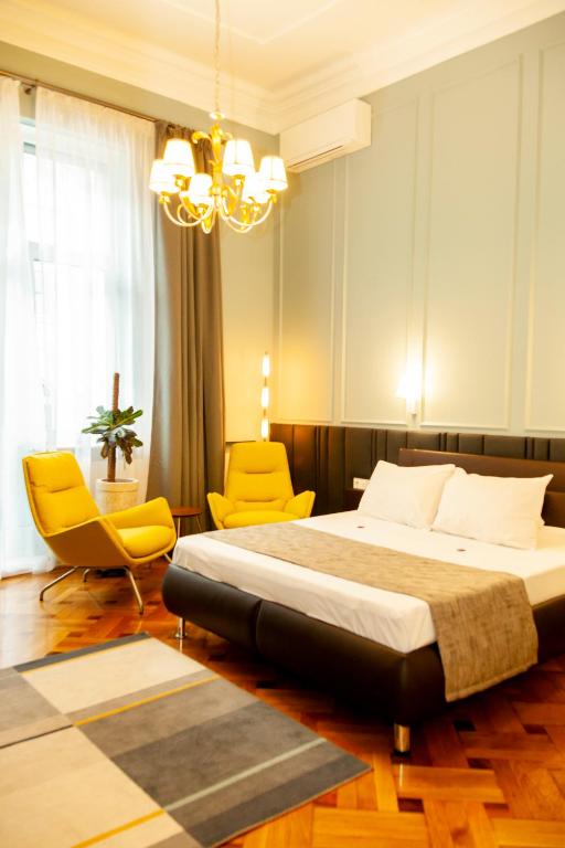 Postel nebo postele na pokoji v ubytování Matei Corvin Apartment