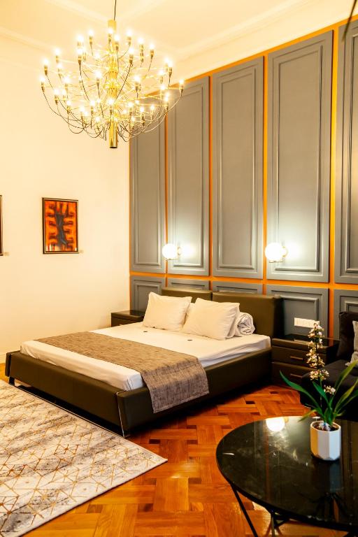 Postel nebo postele na pokoji v ubytování Matei Corvin Apartment
