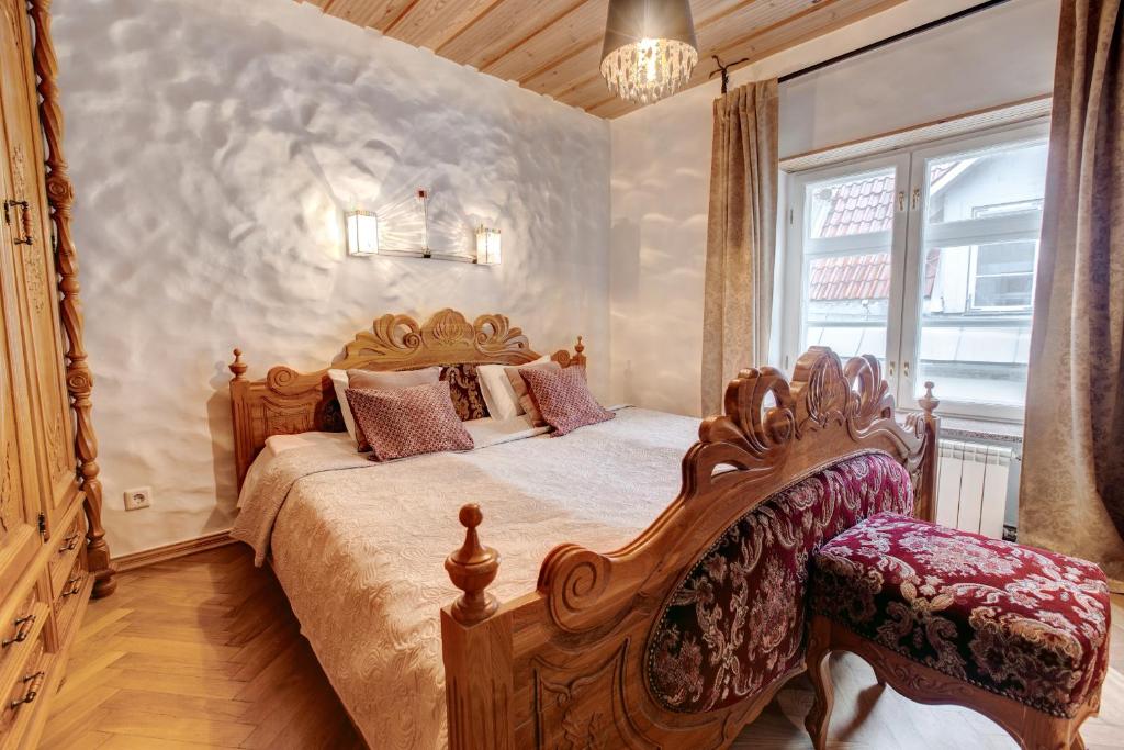 Giường trong phòng chung tại Luxury Suites with sauna by Rikas Hotels