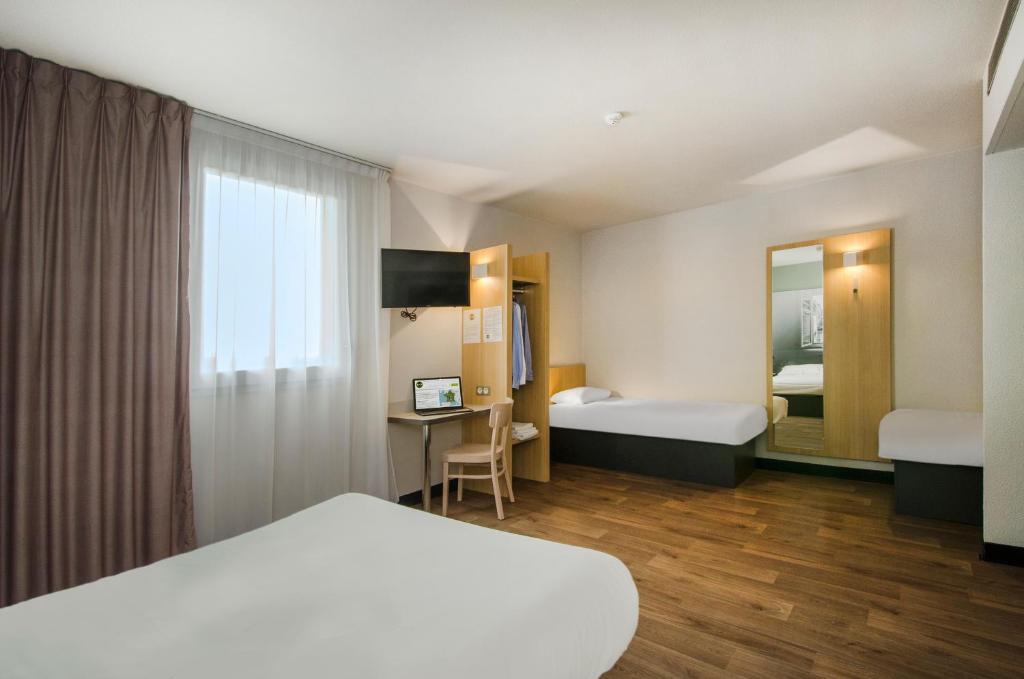 Postel nebo postele na pokoji v ubytování B&B HOTEL Montargis-Amilly