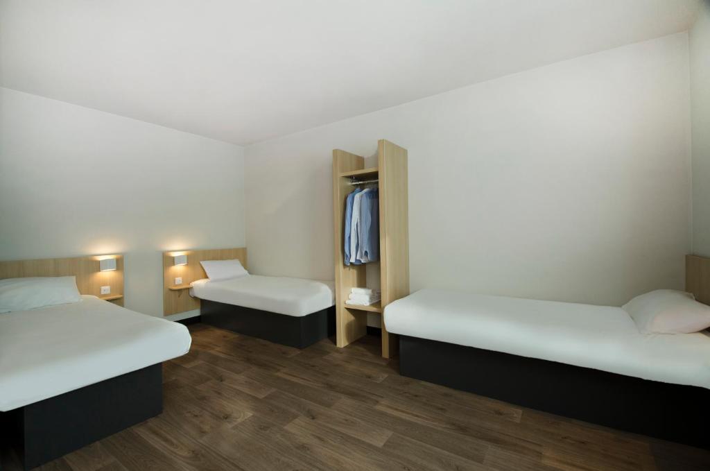 Postel nebo postele na pokoji v ubytování B&B HOTEL Montargis-Amilly