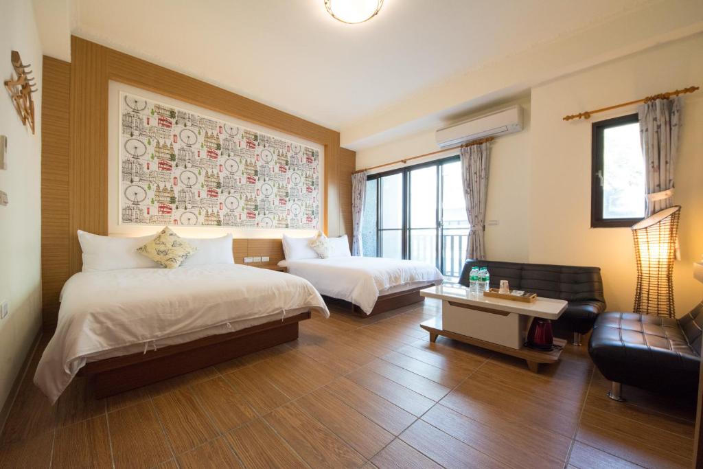 Postel nebo postele na pokoji v ubytování Sioufu B&B