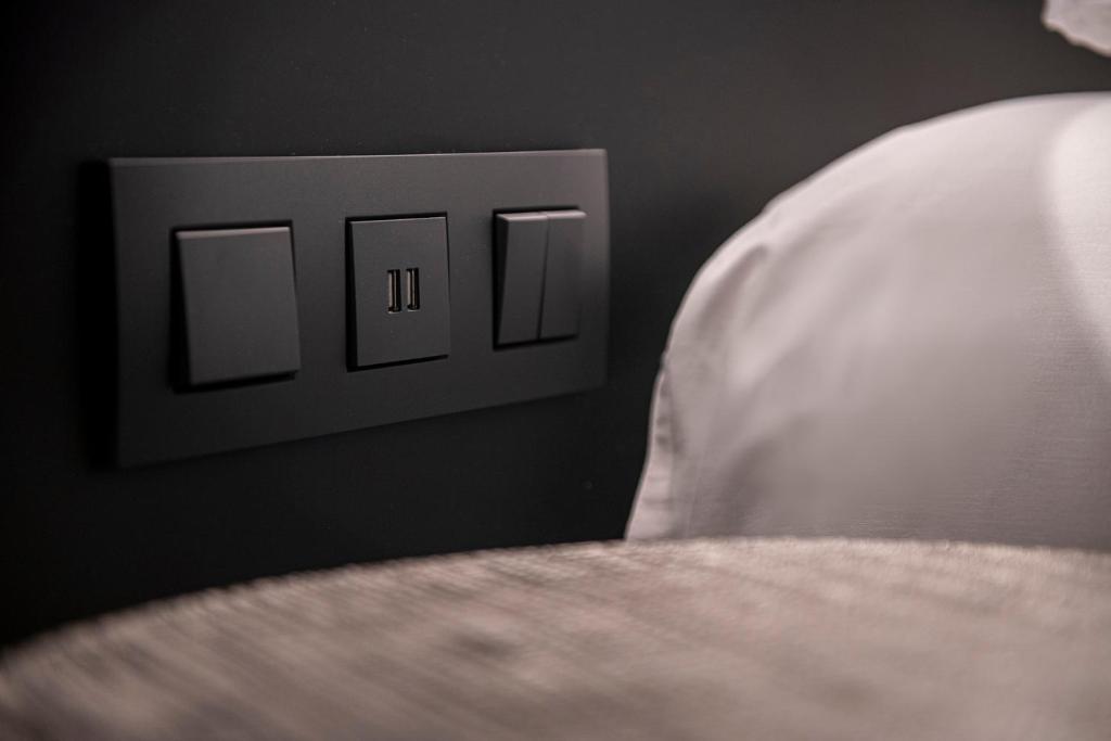 Postel nebo postele na pokoji v ubytování Hotel Pax
