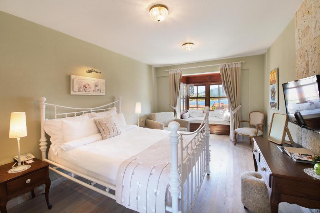 Postel nebo postele na pokoji v ubytování Alacati Kapari Hotel - Special Category