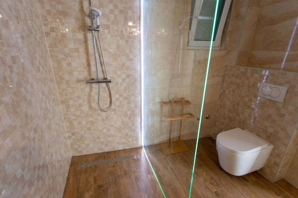 Koupelna v ubytování Villa DVORI