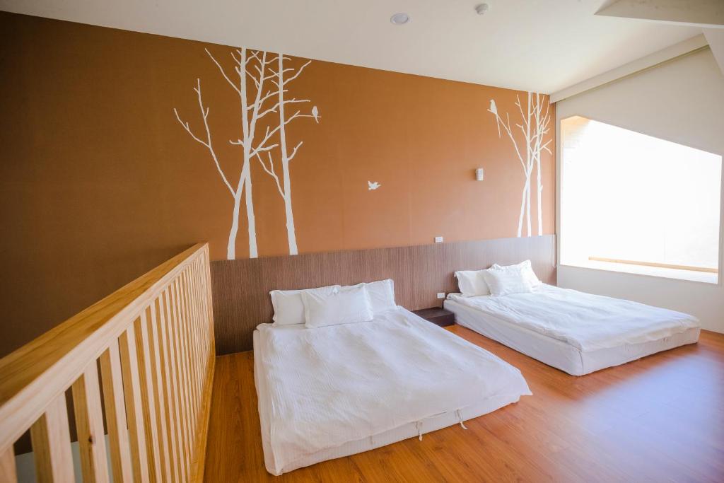 Postel nebo postele na pokoji v ubytování Le Retour Du Printemps Villa