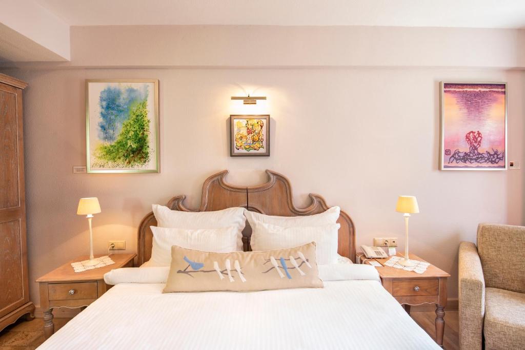 Postel nebo postele na pokoji v ubytování Alacati Kapari Hotel - Special Category