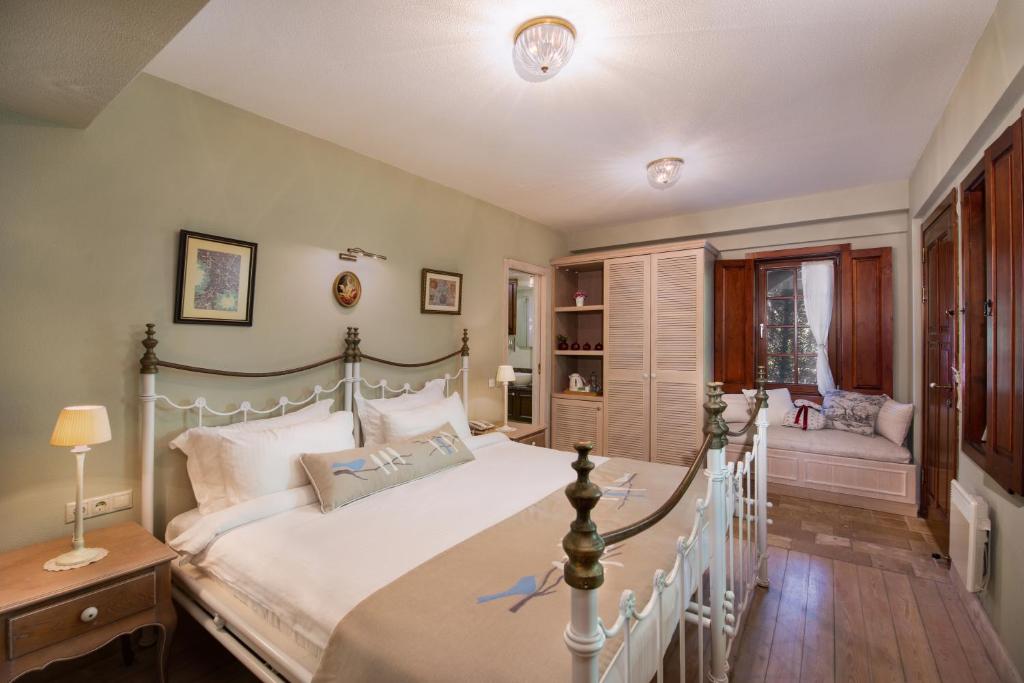 Postel nebo postele na pokoji v ubytování Alacati Kapari Hotel - Special Category