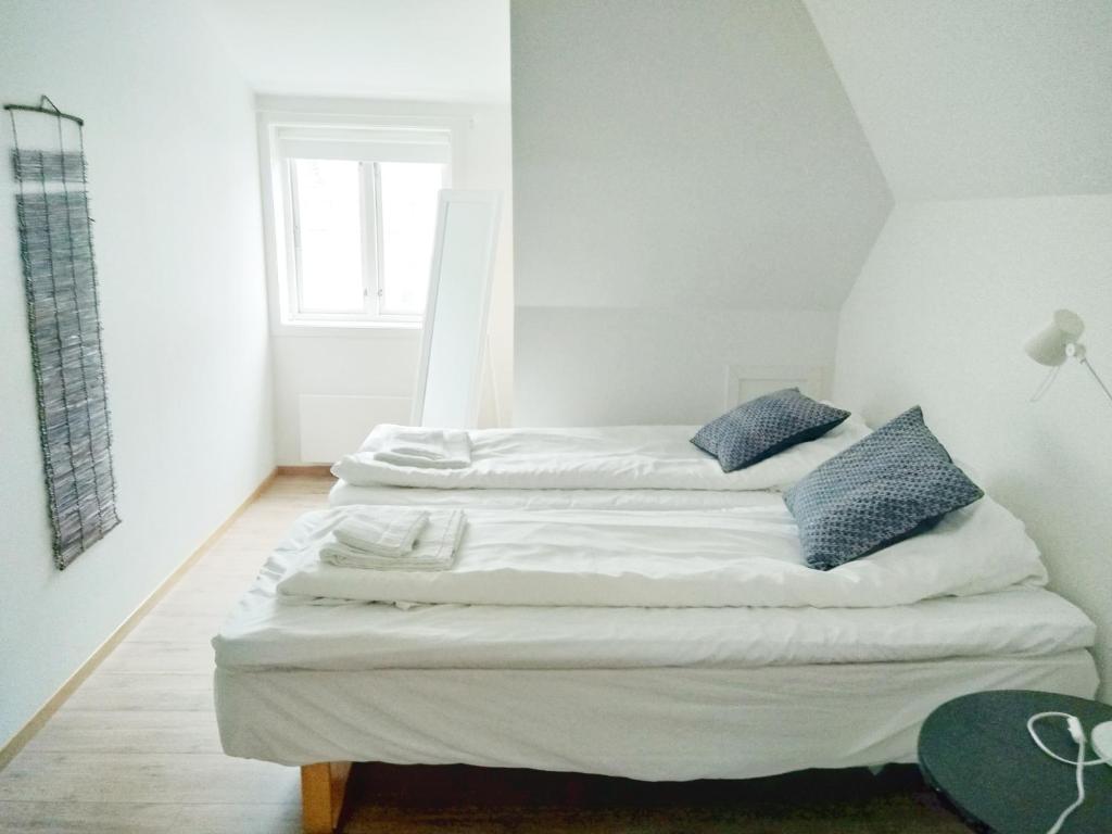 Postel nebo postele na pokoji v ubytování Verkshotellet Jørpeland