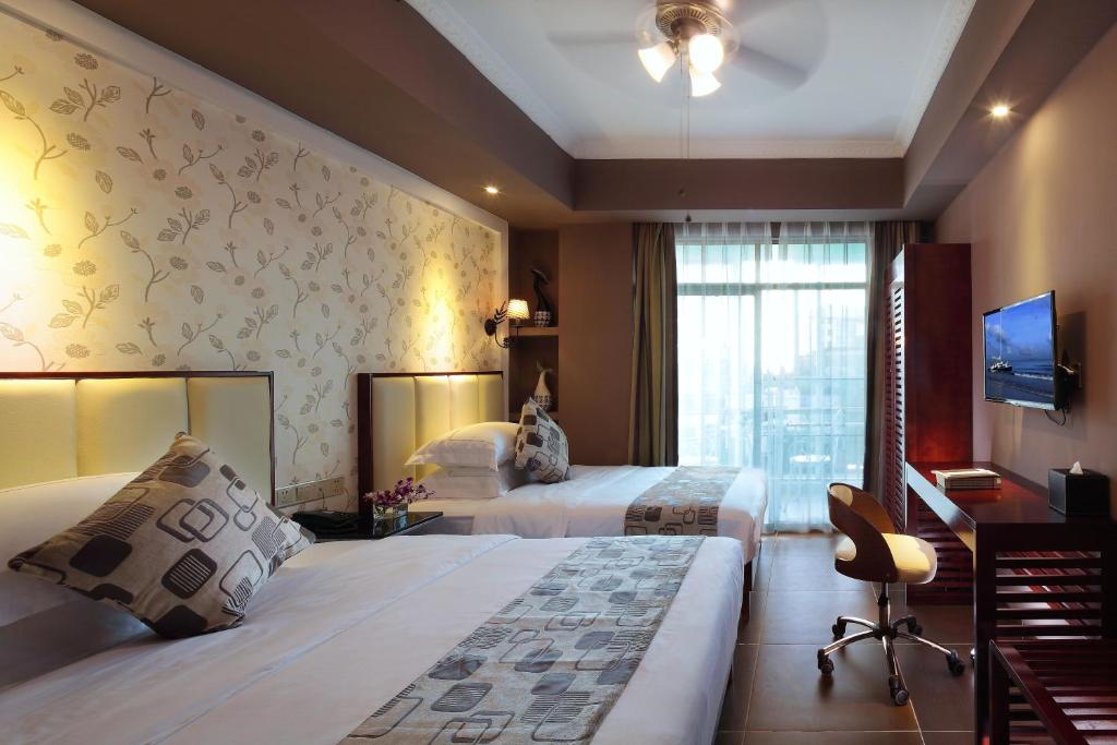Postel nebo postele na pokoji v ubytování Care Hotel Coast Collection