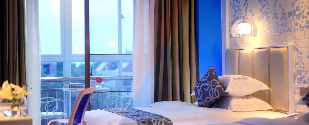 Postel nebo postele na pokoji v ubytování Care Hotel Coast Collection