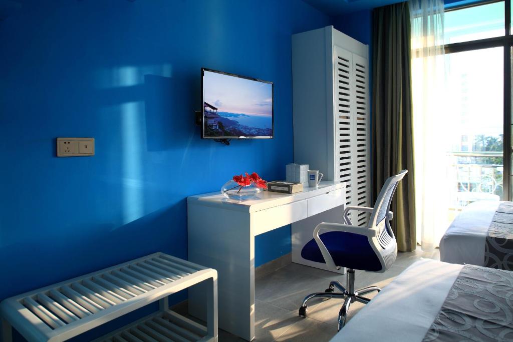 TV a/nebo společenská místnost v ubytování Care Hotel Coast Collection