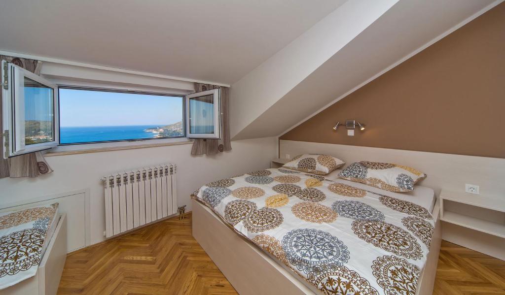 Posteľ alebo postele v izbe v ubytovaní Apartment Residence Narona