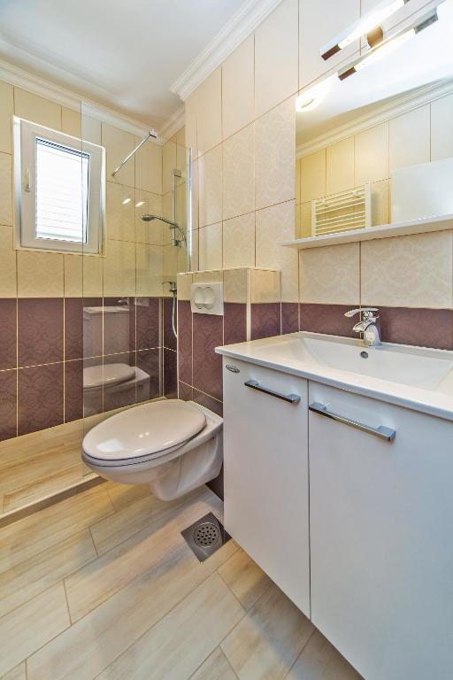 Kúpeľňa v ubytovaní Apartment Residence Narona