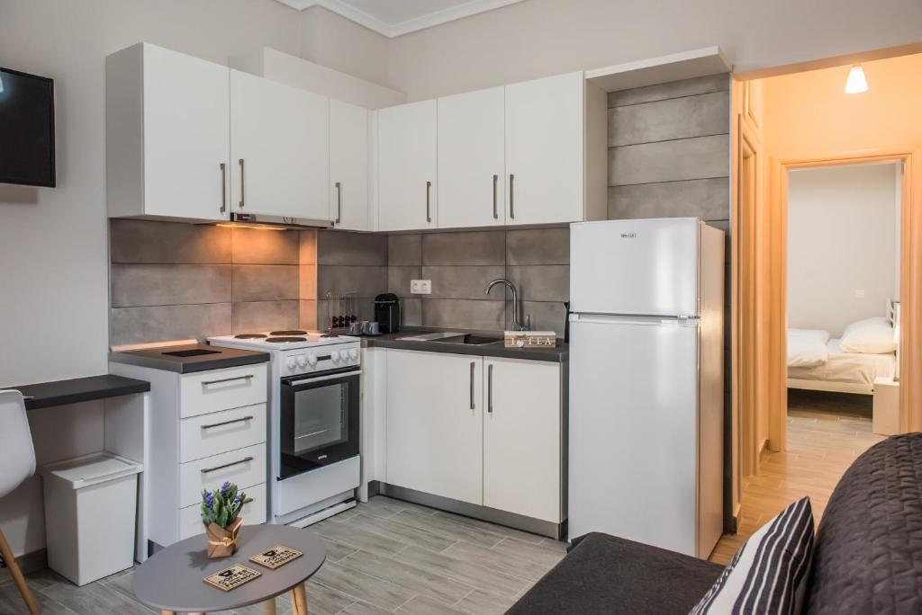 Kuchyňa alebo kuchynka v ubytovaní Freesia #colony_Urban_apartment