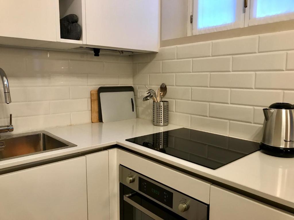Kuchyňa alebo kuchynka v ubytovaní Porta Ticinese Apartment