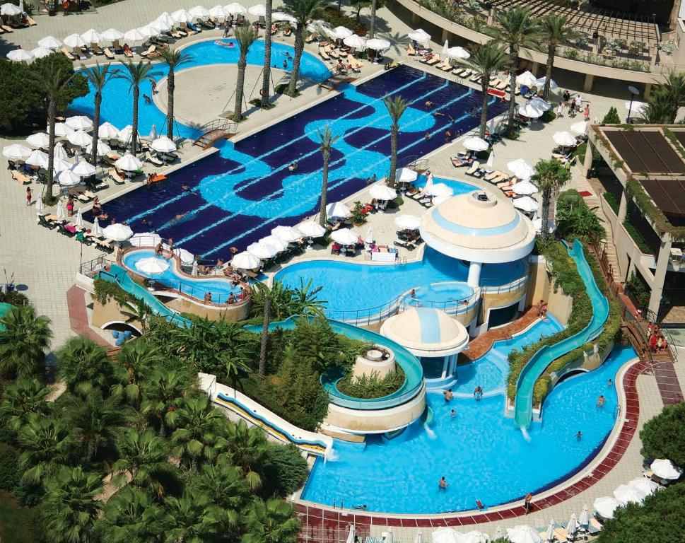 an aerial view of a pool at a resort at Limak Atlantis Deluxe Hotel Belek in Belek