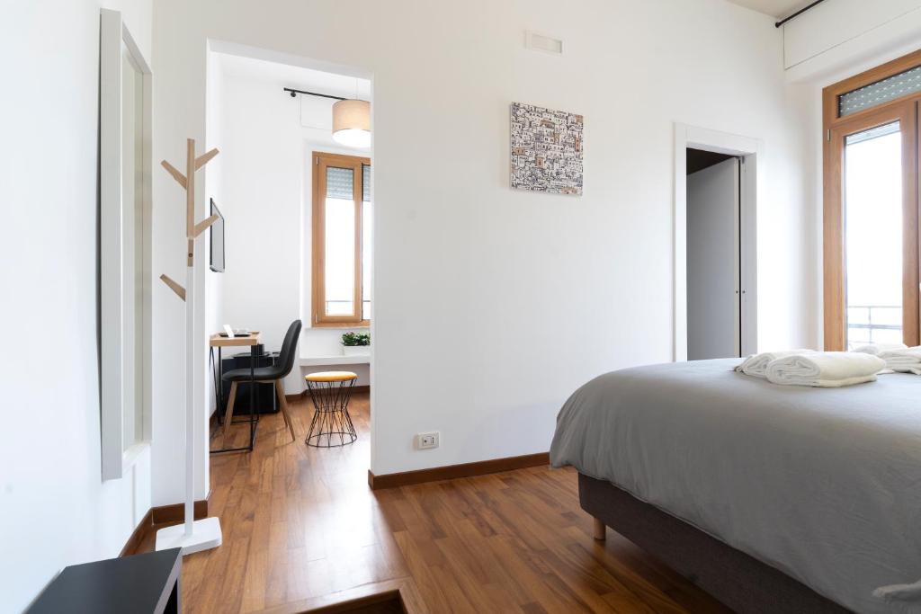 A bed or beds in a room at Florestine Napoli